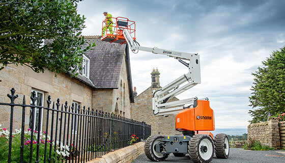 The new Snorkel A46JRTE lithium-powered articulated rough terrain boom lift